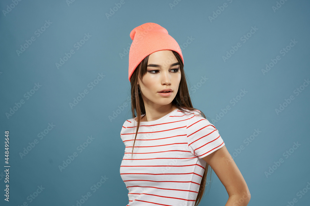 brunette wearing pink hat striped t-shirt fashion modern style brunette wearing pink hat striped t-shirt fashion modern style