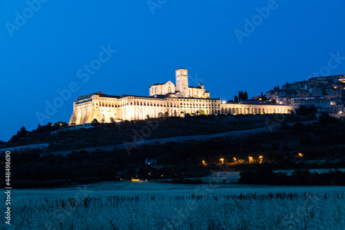 Assisi Basilica by night,  Umbria region, Italy. The town is famous for the most important Italian Basilica dedicated to St. Francis - San Francesco.