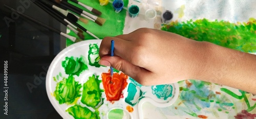 child painting coolers