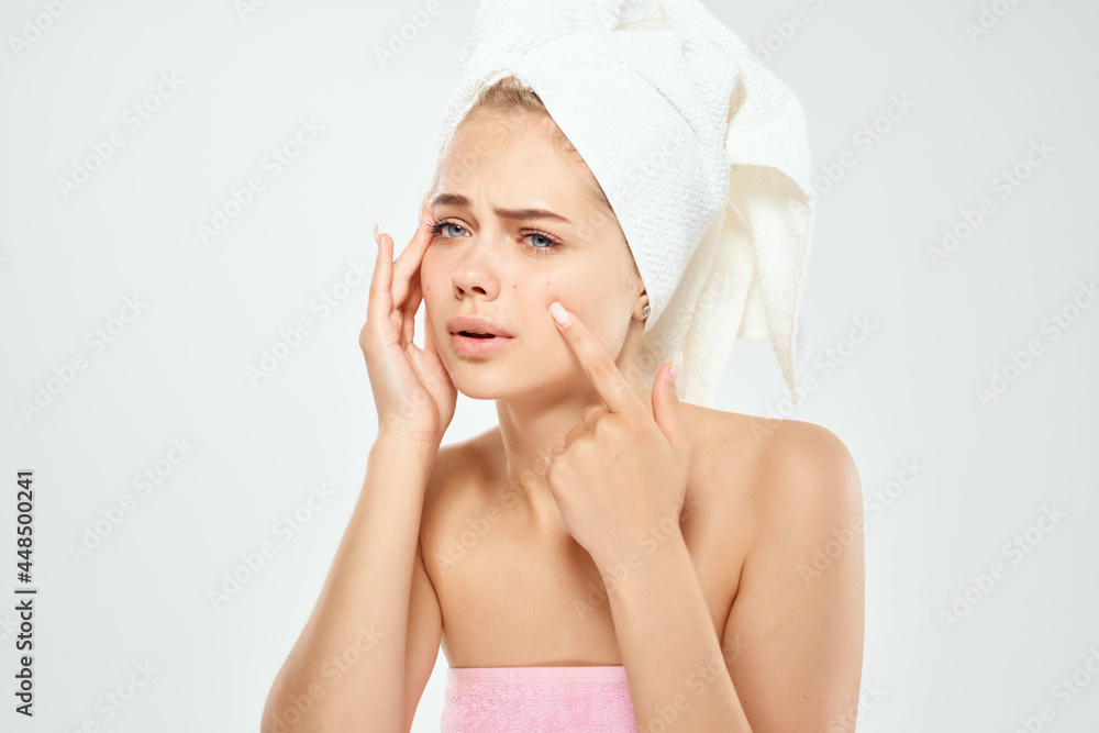 pretty woman holding face skin care dermatology close-up pretty woman holding face skin care dermatology close-up