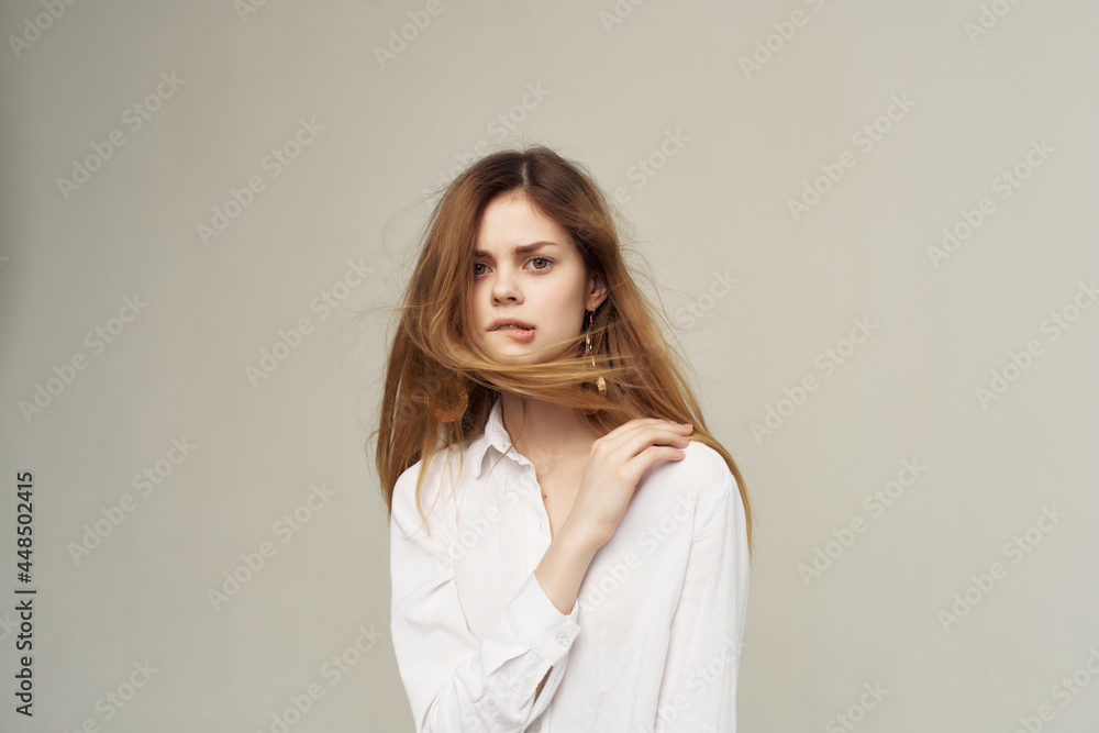 pretty woman with red hair in white shirt fashion home decoration pretty woman with red hair in white shirt fashion home decoration