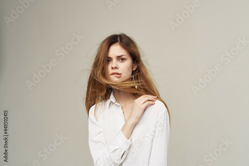 pretty woman with red hair in white shirt fashion home decoration