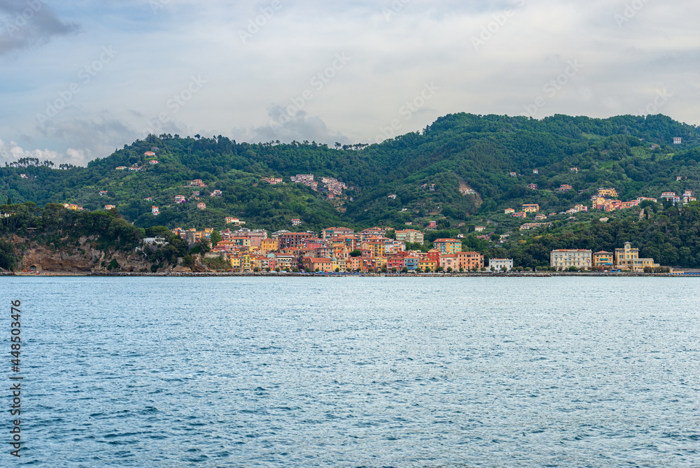 The small village of San Terenzo seen from the sea, Gulf of La Spezia, municipality of Lerici, Mediterranean sea, Liguria, Italy, Europe. 
