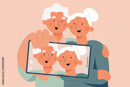 Elderly couple taking selfie