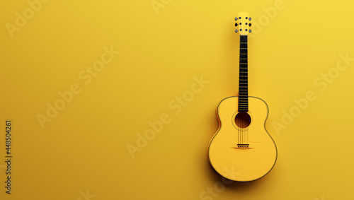 Classical acoustic guitar on yellow background.