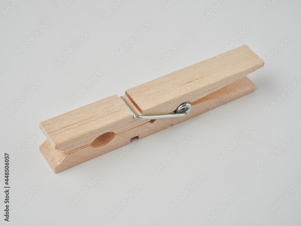 Set of wooden clothes pins on white background Set of wooden clothes pins on white background