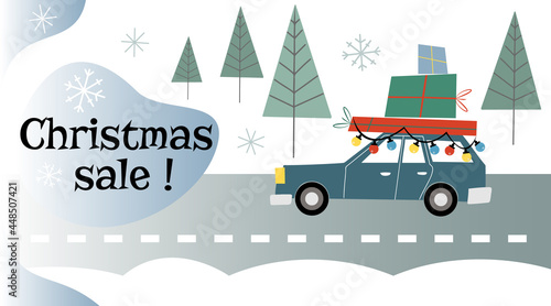 Cute old fashioned banner with lettering Christmas sale in mid century modern style with retro car driving home with packed gifts on a snowy road 