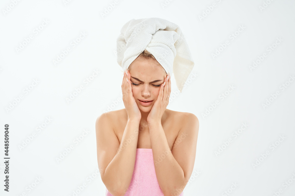 woman with towel on head dermatology skin care close-up woman with towel on head dermatology skin care close-up
