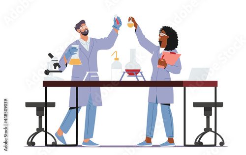 Scientists Wearing Lab Coats Conducting Experiments and Scientific Research in Laboratory. Chemistry Science Staff