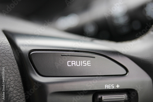 Close up of a cruise control button