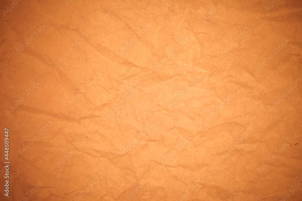 Fototapeta premium Crumpled brown paper background.