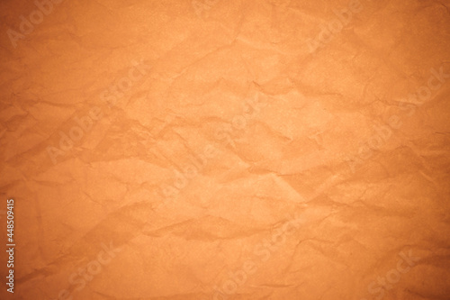 Crumpled brown paper background.