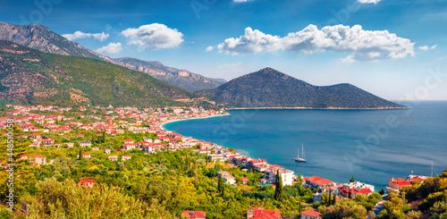 Aerial summer cityscape of Tyros, tourist and old naval town in Arcadia. Attractive morning seascape of Myrtoan Sea. Splendid outdoor scene of Peloponnese peninsula, Greece, Europe.