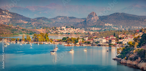 Astonishing summer cityscape of Vivari port. Breathtaking outdoor scene of Peloponnese peninsula, Greece, Europe. Beautiful morning seascape of Ionian sea. Traveling concept background.. photo