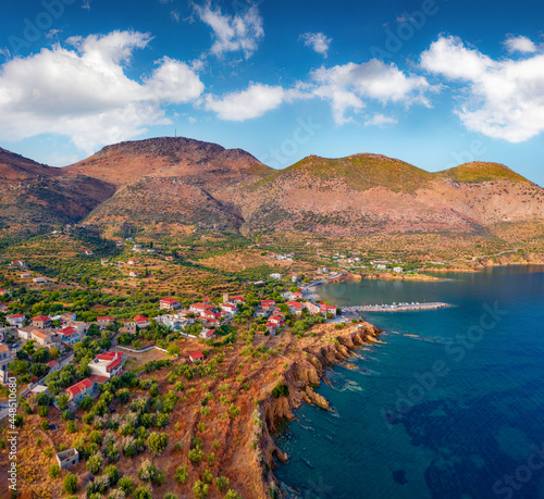 View from flying drone of Kotronas village. Picturesque evening seascape of Mediterranean sea. Beautiful outdoor scene of Peloponnese peninsula, Greece, Europe. Traveling concept background..
