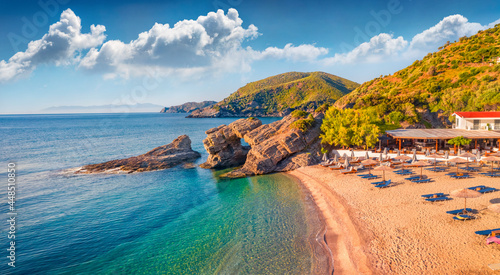 Fototapeta Naklejka Na Ścianę i Meble -  Spectacular morning view of Kama beach in Kalamos village. Sunny outdoor scene of Euboea island, Greece, Europe. Calm summer seascape of Aegean sea.