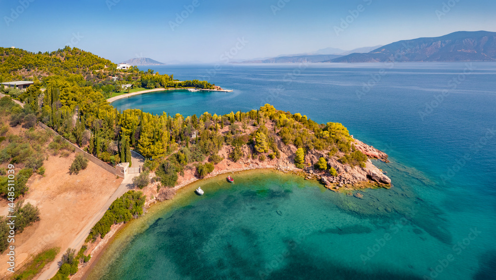 View from flying drone of Thini village. Green summer scene of Peloponnese peninsula, Greece, Europe. Exciting seascape of Myrtoan Sea. Beauty of nature concept background..