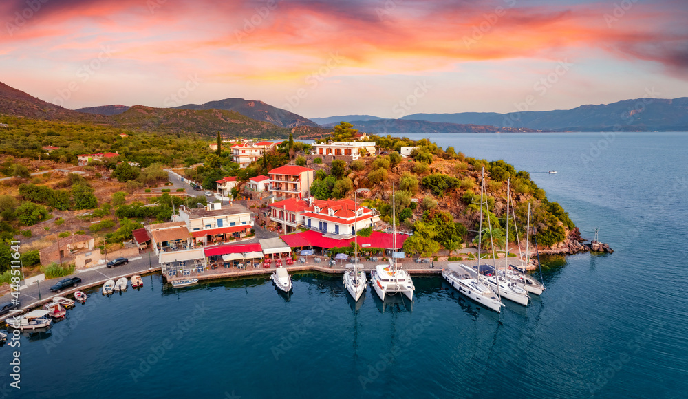 View from flying drone of Vathi port. Exciting sunset in Peloponnese  peninsula, Greece, Europe. Beautiful summer seascape of Myrtoan Sea.  Traveling concept background. Stock Photo | Adobe Stock