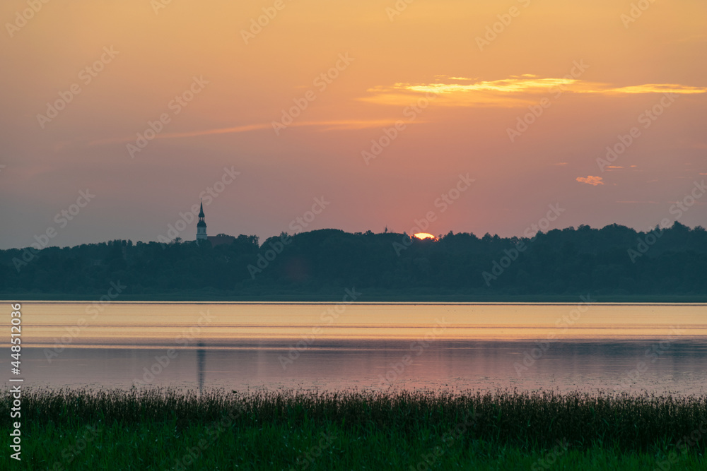 summer landscape on the lake at dawn, dusk, colors of the sky before sunrise, sunrise on the lake, Lake Burtnieki, Latvia summer landscape on the lake at dawn, dusk, colors of the sky before sunrise, sunrise on the lake, Lake Burtnieki, Latvia