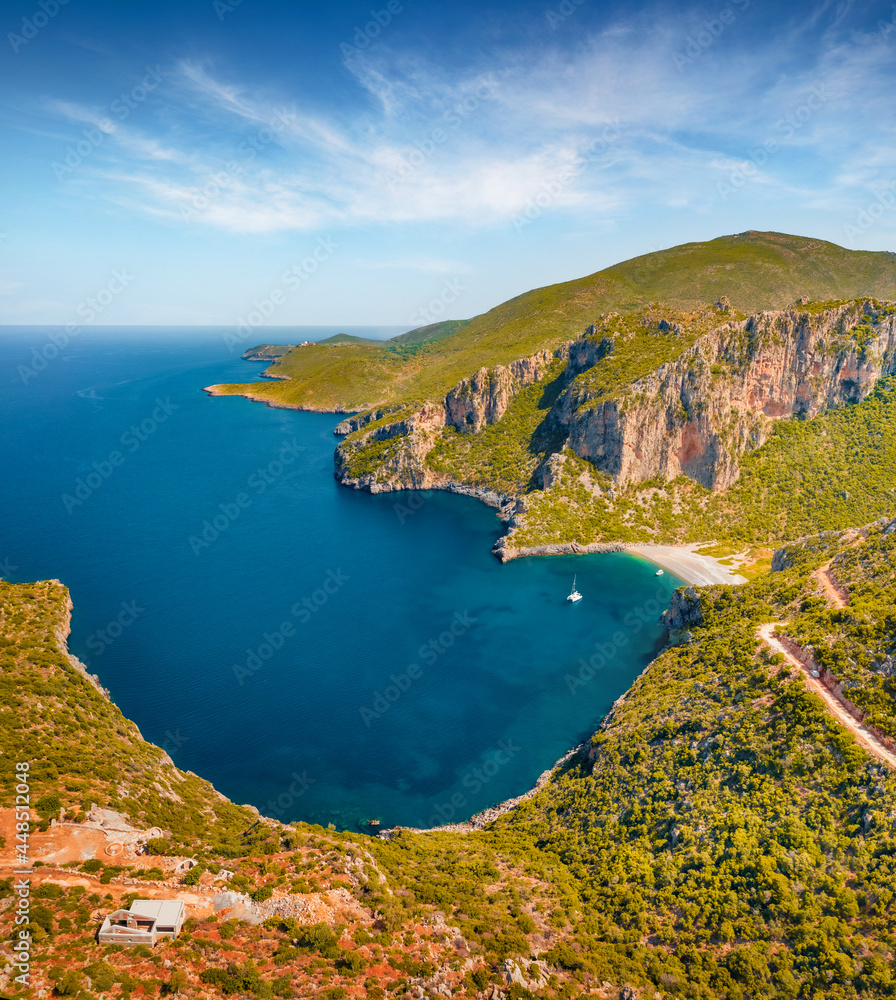 View from flying drone of Damos Beach. Stunning summer scene of Peloponnese peninsula, Greece, Europe. Captivating morning seascape of Myrtoan Sea. Beauty of nature concept background..