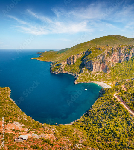 View from flying drone of Damos Beach. Stunning summer scene of Peloponnese peninsula, Greece, Europe. Captivating morning seascape of Myrtoan Sea. Beauty of nature concept background..
