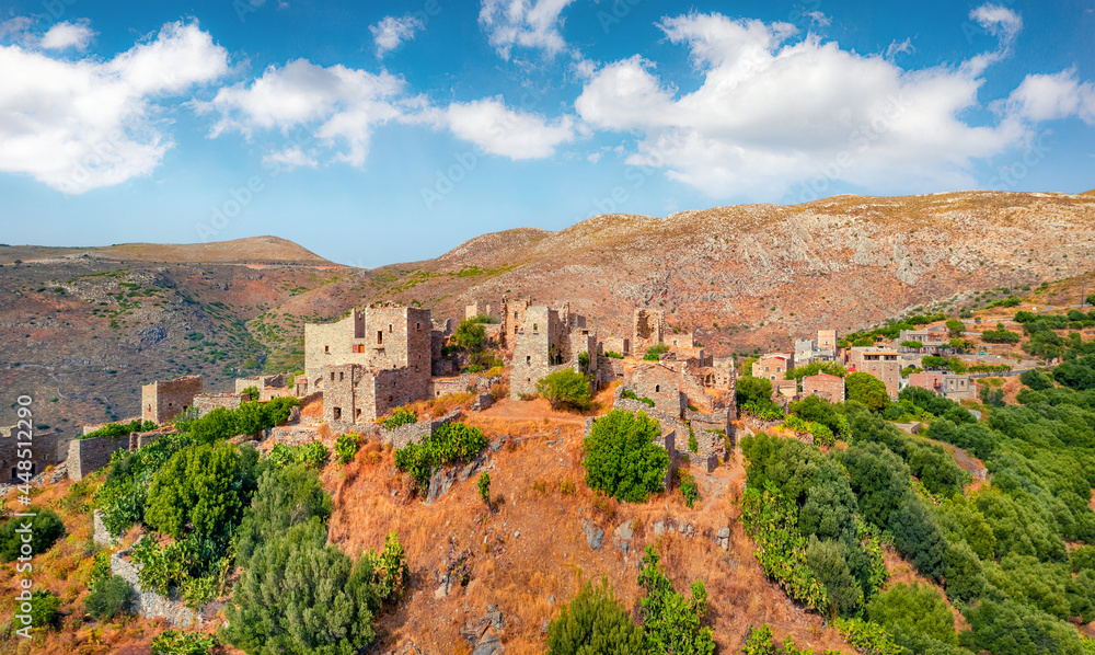 View from flying drone of ancient village fortress of the Mani Peninsula - Vathia. Gorgeous summer scene of Peloponnese peninsula, Greece, Europe. Traveling concept background..