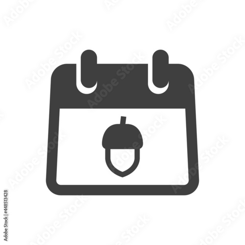 Icono plano con silueta de bellota de roble en calendario sencillo en color gris