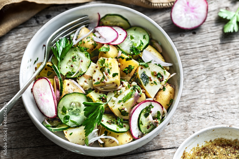 Potato with Cucumber Radish Salad in a bowl Potato with Cucumber Radish Salad in a bowl
