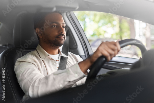 transport, vehicle and people concept - indian man or driver driving car