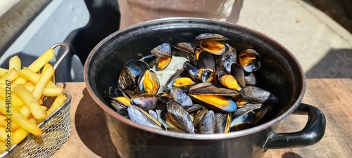 Mussels in a white wine sause served in a pot, France