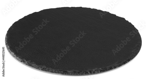 Black round stone plate isolated on white background. Clipping path and full depth of field. Top view