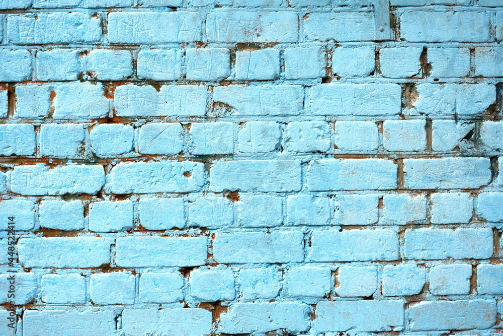 brick wall painted with blue paint brick wall painted with blue paint