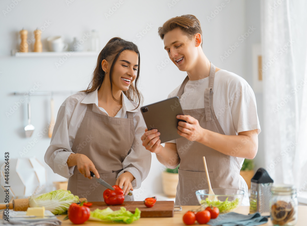 couple is preparing the proper meal couple is preparing the proper meal
