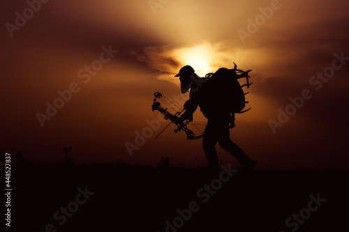 Silhouette of a bow hunter © zorandim75