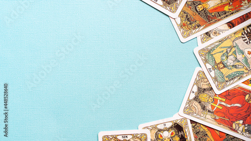 View of Golden tarot cards Frame on the Blue background, esoteric concept, 