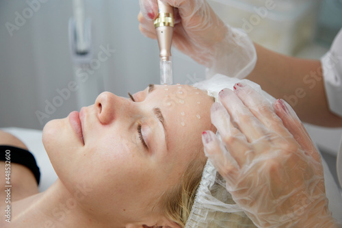 Photography Beautician makes mesotherapy injections