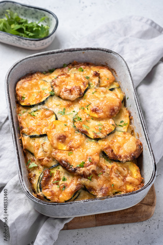 casserole with zucchini squash and cheese in baking dish