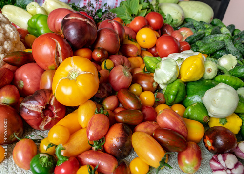 color photo with autumn vegetables on the table  different colors  shapes and types of vegetables prepared for home canning  autumn harvest time