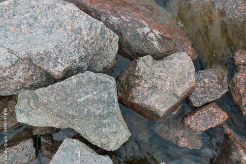 large stones half in water
