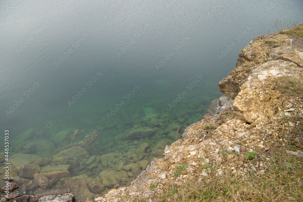 fragment of a rocky lake shore fragment of a rocky lake shore
