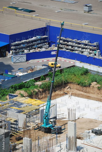 Mobile crane on the construction site © Kataieva