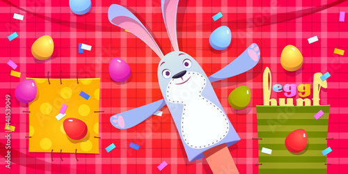 Egg hunt, Easter celebration with bunny puppet