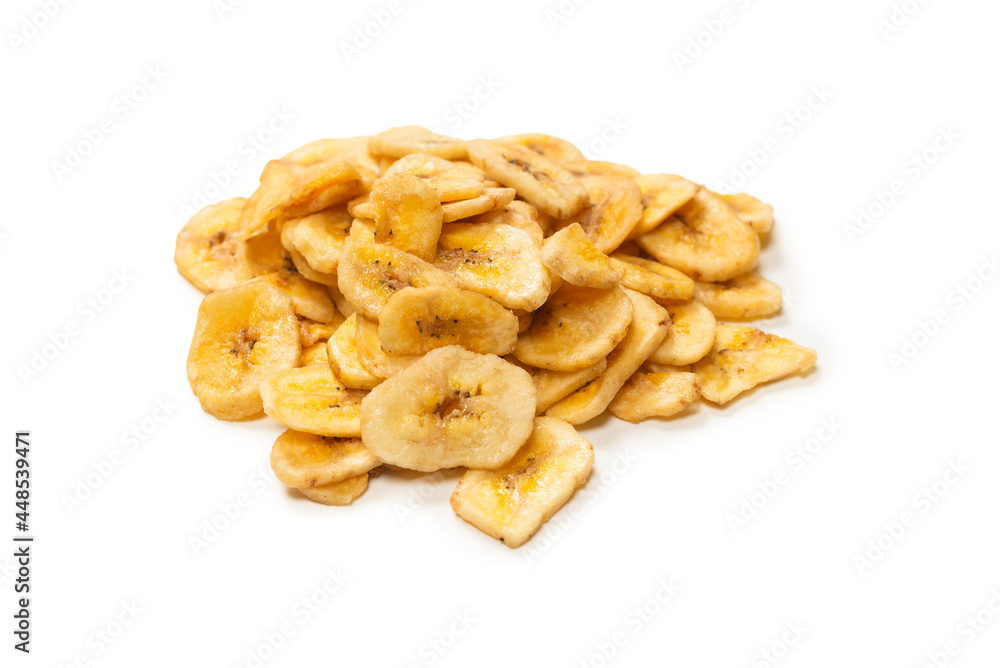 Banana chips isolated on a white background. Dehydrated banana. Banana chips isolated on a white background. Dehydrated banana.