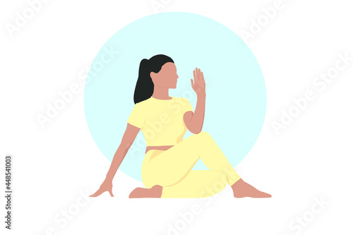 woman doing yoga position in front of blue circle design