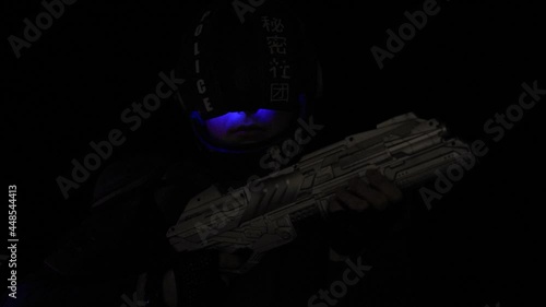 Cyberpunk concept, future world. Police officer cop in dark, halfman bionic cyborg or android reloads gun, twitches cocking lever, Stands looks at camera in dark. Science fiction scene, fantasy, sci photo
