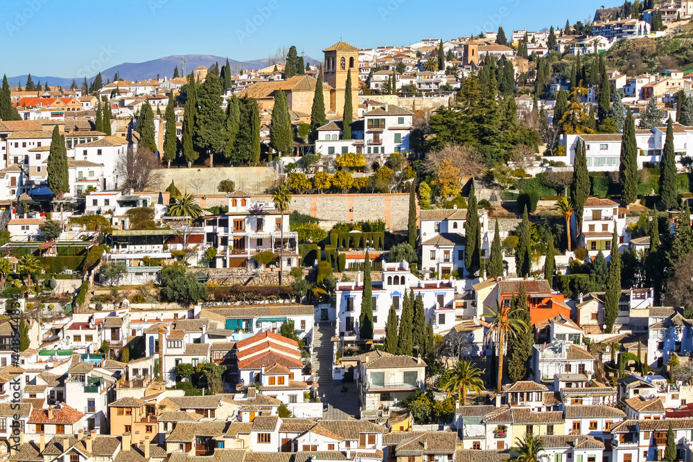 Albaicin neighborhood in Granada with its old houses and churches. The Alhambra.