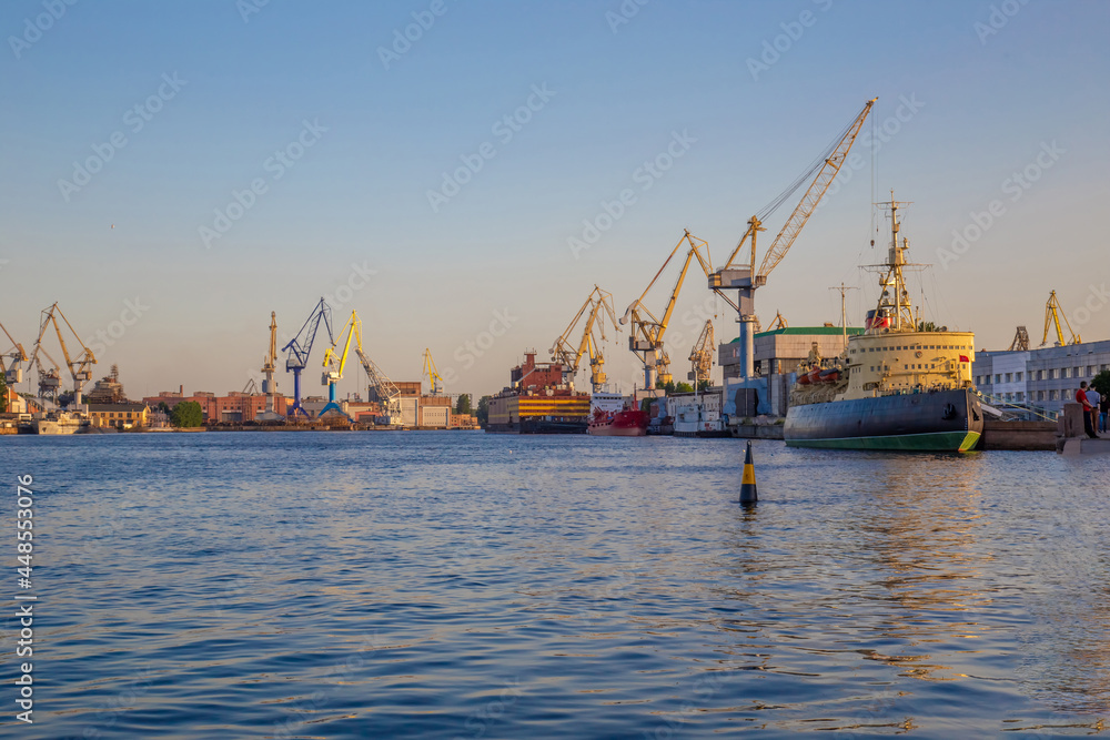 View of the port, panorama of the summer sunset of St. Petersburg. Russia.
