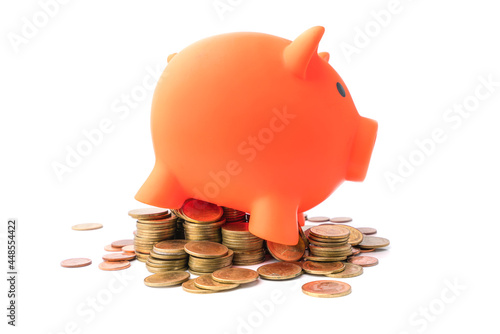 Stacking coins pile and white piggy bank for savings with money and planning step up to growing. Saving money and Grwoth business success concept. photo