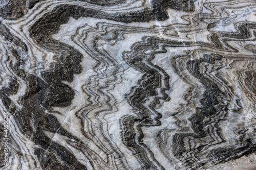 Abstract gray texture of natural, raw salt in an underground salt mine