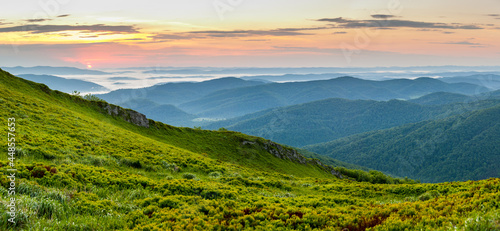 Fototapeta Naklejka Na Ścianę i Meble -  Sunrise seen from the summit of Połonina Wetlińska towards the Bieszczady peaks, Bieszczady forest, Bieszczady mountains, Carpathians